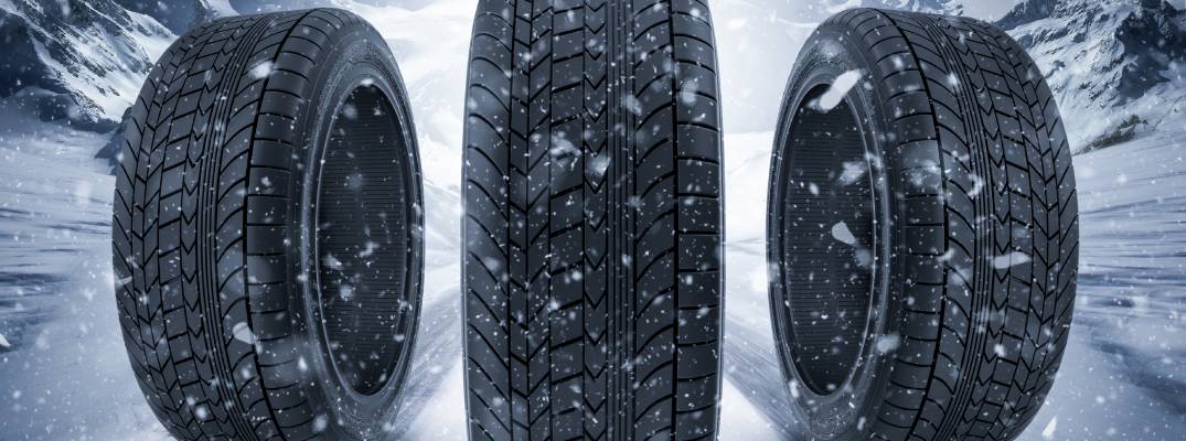 Tires lined up with snow in background