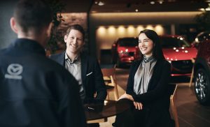 Unknown people talking to Mazda associate